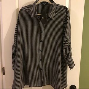 Black and white striped, buttons up, collared tunic